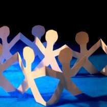 A chain of paper cutout people